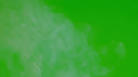 White smoke floating slow motion on green screen background Video stock 221671304
