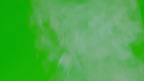 White smoke floating slow motion on green screen background 動画素材 221671611