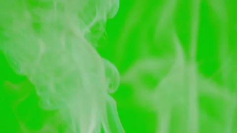 White smoke floating slow motion on green screen background 動画素材 221671617