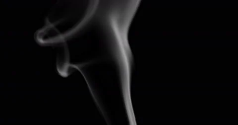 White smoke floating through space against black background Stock Footage 100243774