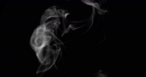 White smoke floating through space against black background Stock Footage 100244099