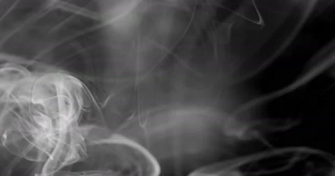 White smoke floating through space against black background Stock Footage 100244113