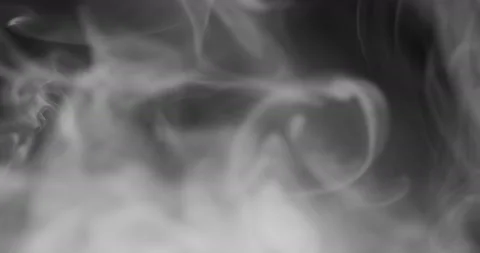 White smoke floating through space against black background Stock Footage 100256087