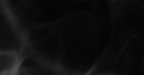 White smoke floating through space against black background Stock Footage 130363963