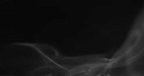 White smoke floating through space against black background 스톡 동영상 139762856