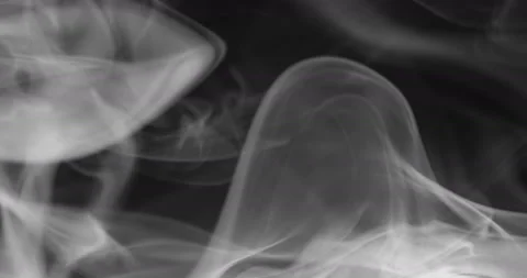 White smoke floating through space against black background Stock Footage 140687593