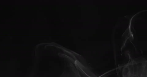 White smoke floating through space against black background Stock Footage 141073225