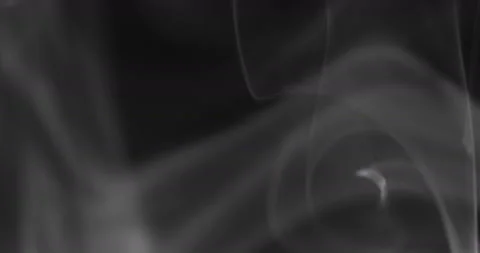 White smoke floating through space against black background Stock Footage 141074265