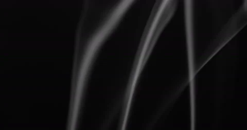 White smoke floating through space against black background Stock Footage 141341784