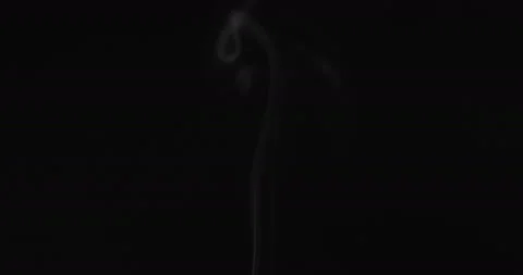 White smoke floating through space against black background Stock Footage 144630883
