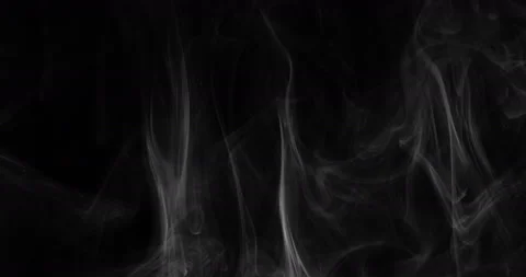 White smoke floating through space against black background Stock Footage 144832627