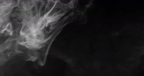 White smoke floating through space against black background Stock Footage 145021468