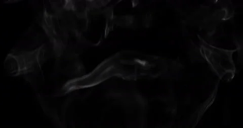 White smoke floating through space against black background Stock Footage 145179108