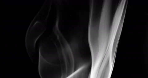 White smoke floating through space against black background Stock Footage 145179209