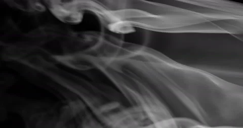 White smoke floating through space against black background Stock Footage 145415874