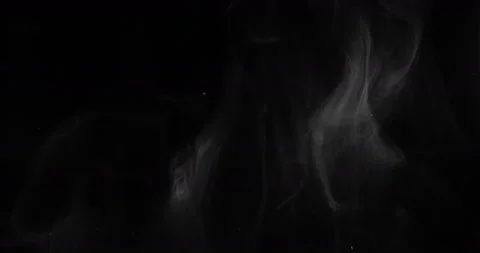 White smoke floating through space against black background 스톡 동영상 145416433