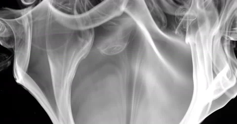 White smoke floating through space against black background Stock Footage 147442639