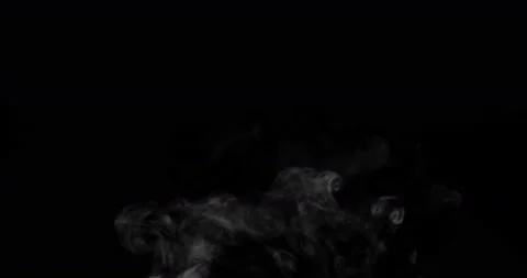 White smoke floating through space against black background Video stock 148535197