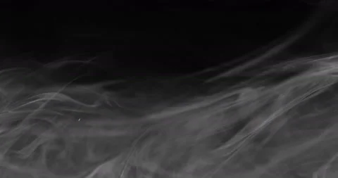 White smoke floating through space against black background Stock Footage 149147650