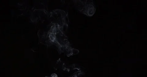 White smoke on an isolated black studio background Stock Footage 99690459