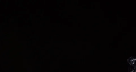 White smoke on an isolated black studio background Stock Footage 99690490