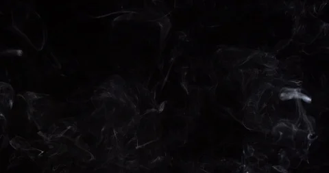 White smoke on an isolated black studio background Stock Footage 99690495
