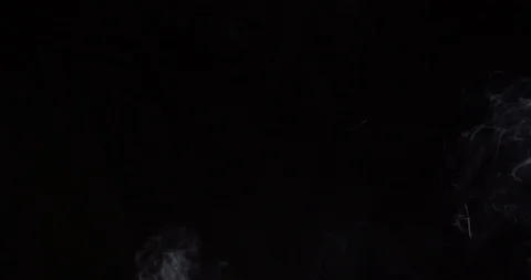 White smoke on an isolated black studio background Stock Footage 99690558