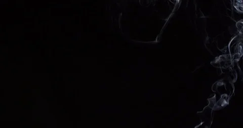White smoke on an isolated black studio background Stock Footage 99690597