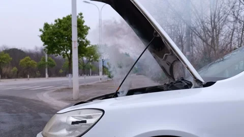 White smoke keeps coming from the broken engine bay. Stock Footage 329166944