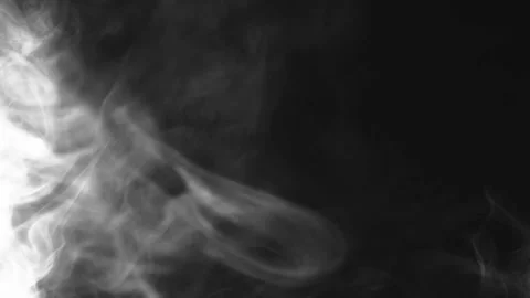 White smoke moves from right to left on a black background Stock Footage 105676271