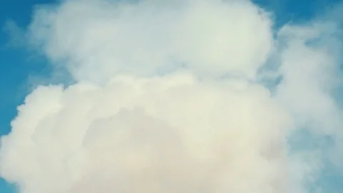 White smoke or cloud on clean blue sky. Ideally for background. Abstract concept Stock Footage 72742682