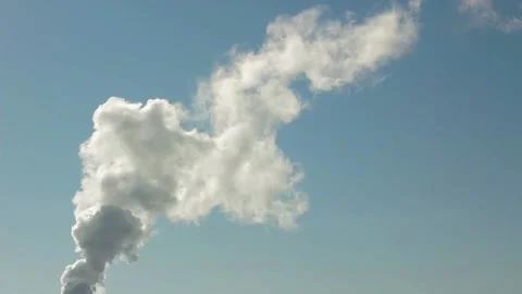 White smoke quickly comes out in the sky with no wind Stock Footage 132334737