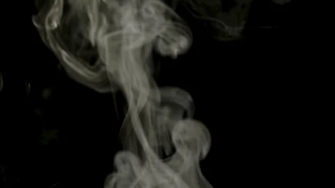 White smoke streams up on a black background. Smoke for your project Stock Footage 126909805