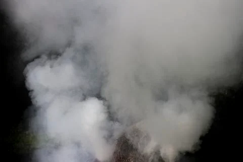 White smoke thick from the fire. Stock Photos