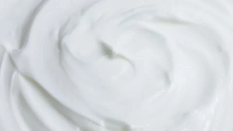 White smooth creamy moisturizing face cream texture rotation Video stock 234780590
