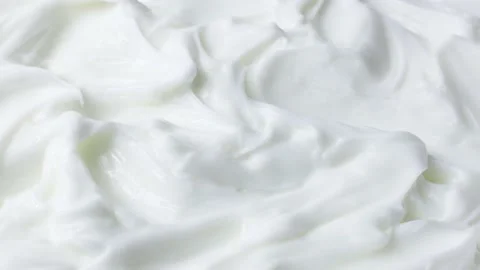 White smooth creamy moisturizing face cream texture rotation close up Stock Footage 234780612