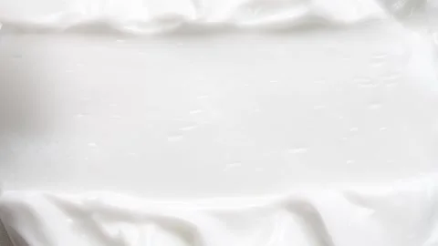 White smooth eye, makeup skin cream texture, closeup beauty facial cosmetic mask Stock Footage 309360616
