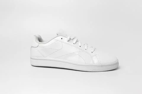 White sneaker profile on white background. Stock Photos