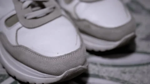 White Sneakers Close-Up: Texture and Design Video stock 312012246