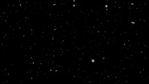 White snow on a black background in 4k. Stock Footage 121499543