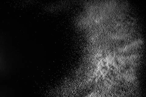 A white snow on the black background Stock Photos