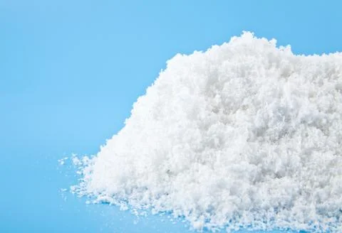 White snow on a blue background Stock Photos