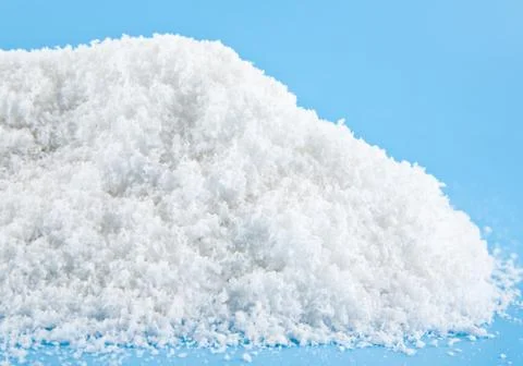 White snow on a blue background Stock Photos