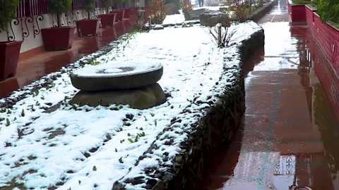 White snow fallen on the rocks with trees beside them 库存影片 148254319