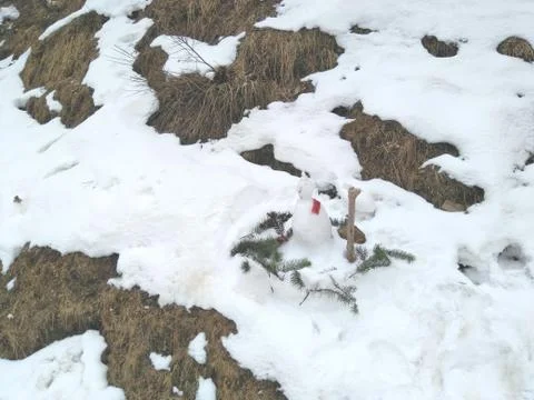 White snow patch on a hill selective focus Stock Photos