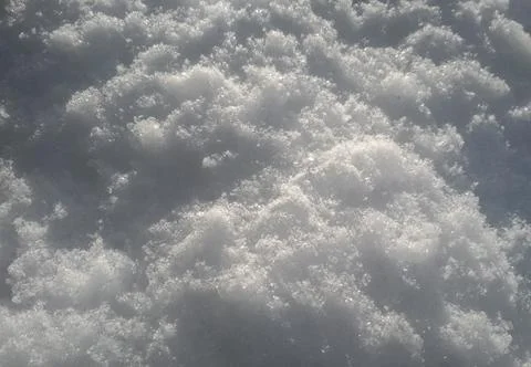 White snow surface background - top view of fresh snow texture on the ground Stock Photos