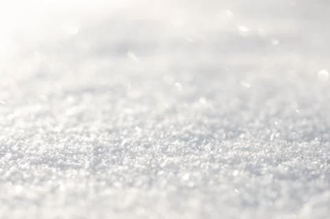 White snow surface close up and flakes background Foto stock