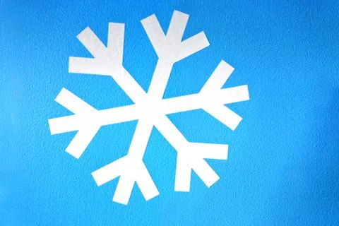 White snowflake on light blue background Stock Illustration
