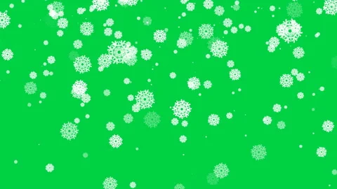 White snowflakes with beautiful pattern fly down on a green background Stock Footage 219347895
