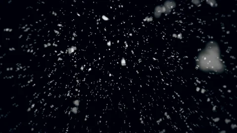 White snowflakes falling down on dark background Video stock 165372179